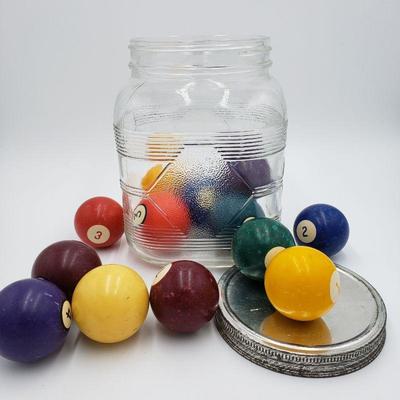 Billiard balls in vintage jar