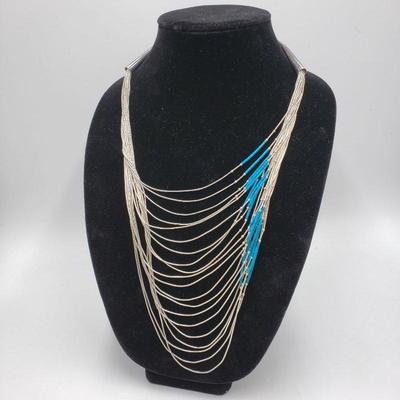 Stunning 20 strand liquid silver and turquoise necklace