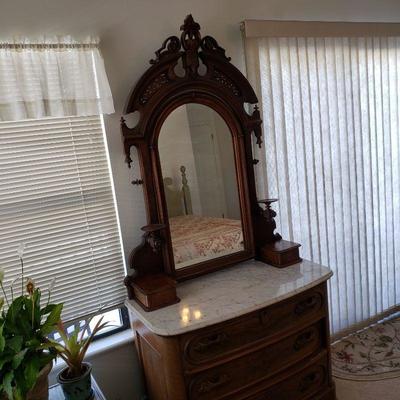 Gorgeous antique hand-carved wood and marble top dresser with mirror