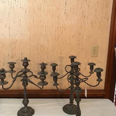 four or more silver -plate candelabras 