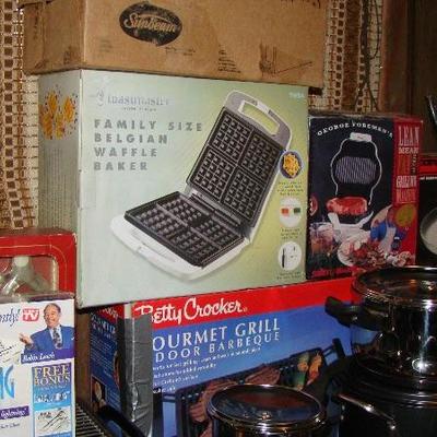 Belgian waffle maker, Betty Crocker indoor barbecue, silver tarnish remover, pots and pans