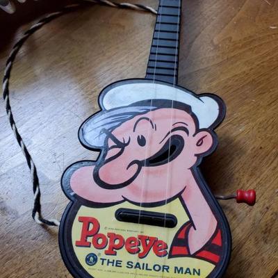 1950's Popeye wind guitar, works