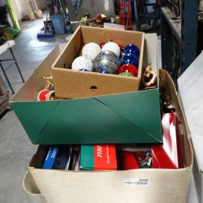 Lot of ornaments, Christmas decor and lights.