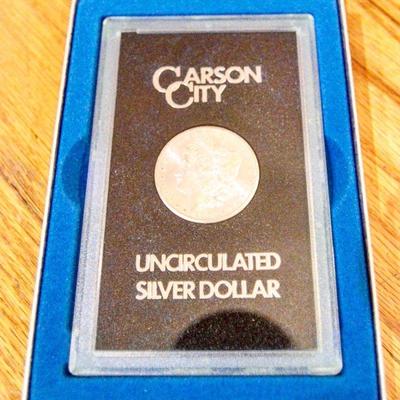 The 1884 Morgan CC (Carson City) Silver Dollar - Uncirculated. Each coin comes with serial number, case & box.