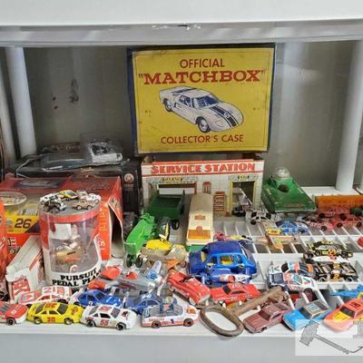 4586: Matchbox Collectors Case, Pedal Planes, Nascar Cars and more!
Also includes metal service station frame, metal john derr tractor,...
