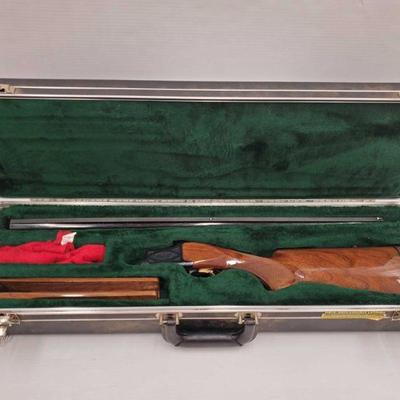 507: Browning Citori 12ga Pump Action Shotgun with Case
Serial number: 05320 Barrel Length: 28