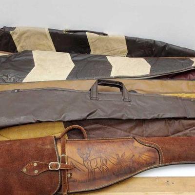 882: Nine Leather Rifle Cases
Measurements range from 36