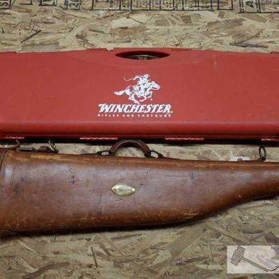 885: Winchester Riffle Case and Leather Rifle Case
Measures approx 30