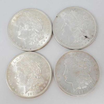 2062: Four 1921 Morgan Silver Dollars
All are Philadelphia Mint