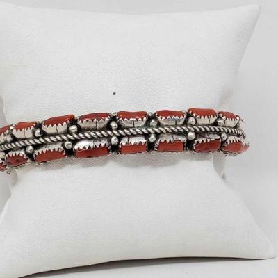 1101: 	
Native American Handmade Sterling Silver Coral Cuff Bracelet
This beautiful Native American Handmade Sterling Silver Coral Cuffed...