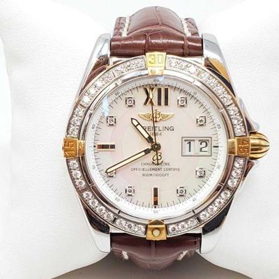 1105: Breitling Diamond Bezel Wrist Watch with Mother of Pearl Face - Authenticated!
Measures approx 42mm. Markings on back B49350, 935703