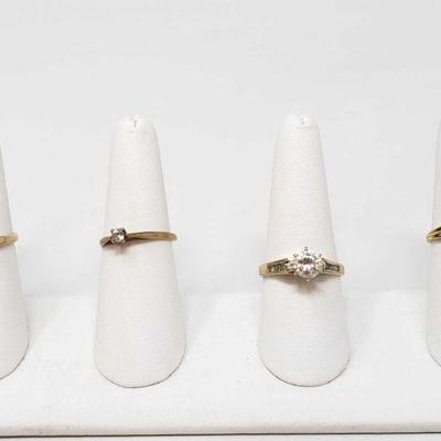 1251: Four 10k Gold Rings, 8.4g
Four 10k gold rings All together rings weigh 8.4g Ring sizes are approximately 6.5, 7, 9,