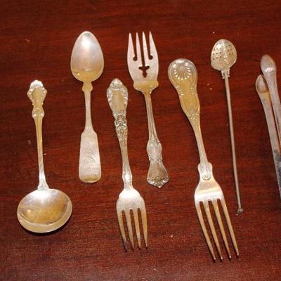 Sterling spoons, forks
