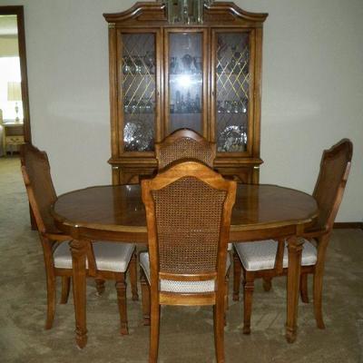 View of Stanley Furniture Co. Dining room Table with 4 chairs shown (8 chairs in total).