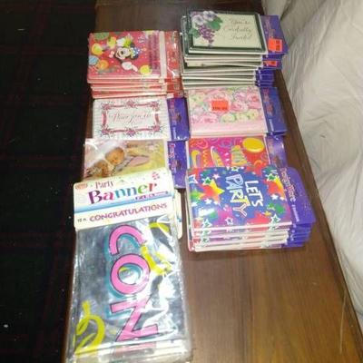 (29) 8 packs of invitations and (28) 12ft foil Con ...