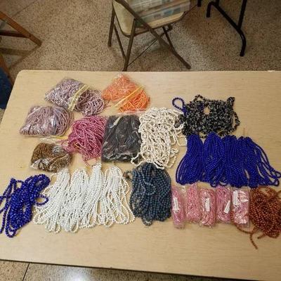 large lot of assorted beaded strands.