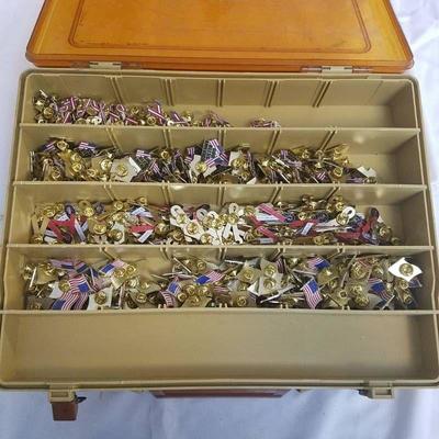 tackle box with assorted USA themed pins
