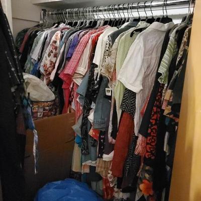 Dozen racks and hundred totes of beautiful clothing