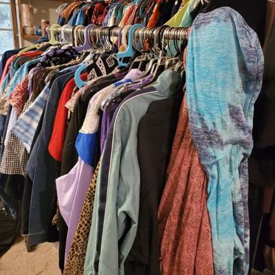 Dozen racks and hundred totes of beautiful clothing
