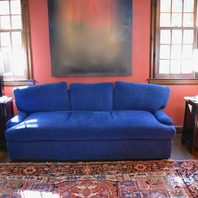 Blue sofa and Oriental rug, measuring approx. 9' X 12'