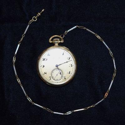 Pocket watch with gold chain
