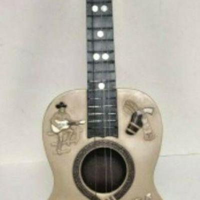 WY3013: VINTAGE 1950s PLASTIC CHILD'S GUITAR WESTERN FOLK 32 IN NEEDS STRINGS  https://www.ebay.com/itm/113936589076