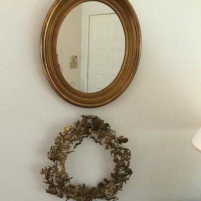 Gold oval mirror $35
Metal Christmas wreath $20 Sold