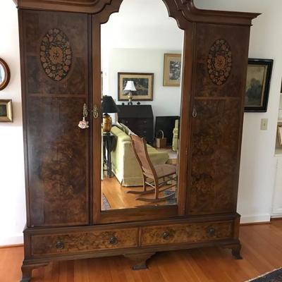 Antique inlaid armoire with beveled mirror $2,990
70 X 21 X 94