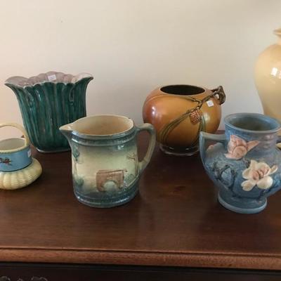 Stengli vase $20
Roseville pinecone vase $65 SOLD
Roseville blue vase with handles $49 SOLD
Roseville unmarked "The Bridge"...