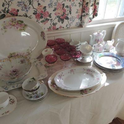 transferware platters, oriental plates, cranberry champagne stems, tea service