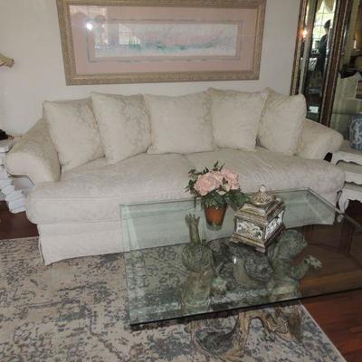 White brocade deep sofa. Don't be afraid of white just scotch guard once a year!