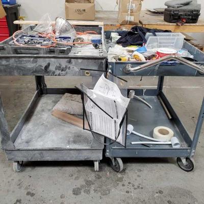1021: Two Push Carts w/ Various items
Both carts have wheels. Measure approx. 45