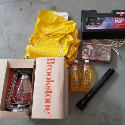 4003;: Camp Items, Tire Chains, Flashlight, Lamps and Couples Kit
4 lamps, Two bottles lamp oil, flashlight, rain jacket, pants and...