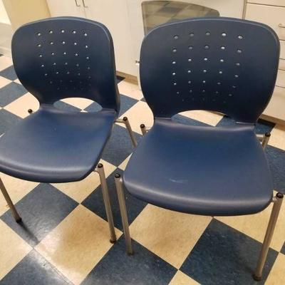 (2) Blue Plastic Office Chairs