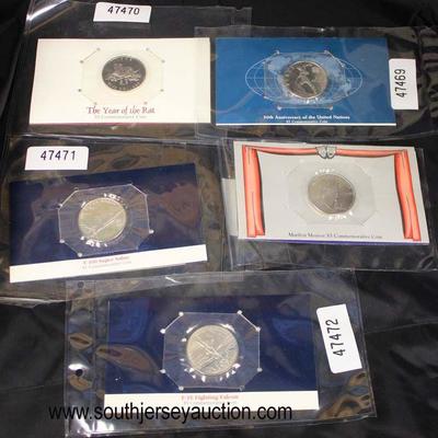  Selection of Commemorative Coins including: F-16 fighting Falcon, Marilyn Monroe,

50th Anniversary of the United Nations, The Year of...