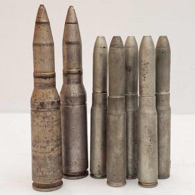 860:  Five WWII 20mm Dummy Drill Cartridge and Two 55mm Dummy Cartridge Round
Five 20mm and two 55mm