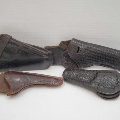 825: 4 Leather Gun Holsters
Brands include Bucheimer L.A. Calif. Clark, Page Leather and Bianchi Model #27 Measures approx 9