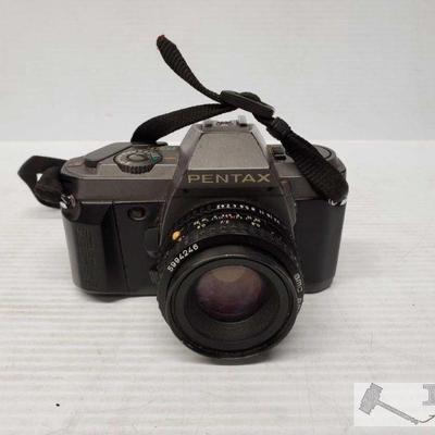 9064: Pentax P30t Camera w/ Pentax-A 50mm lense
Pentax P30t Camera w/ Pentax-A 50mm lense. Camera has strap