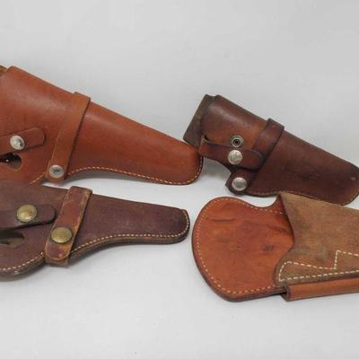 831: 4 Leather Gun Holsters
Brands include Hunter and measure approc from 7