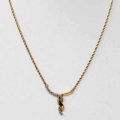 1040: 14k Gold Necklace with Diamond Pendent, 11g
Measures approx 19