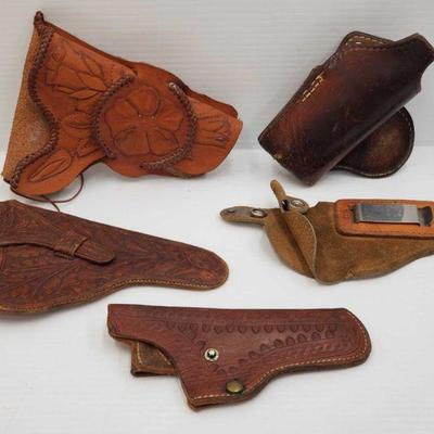 830: 5 Leather Gun Holsters
Brands include Brauser Bros MFG and Bianchi Measures approx 6