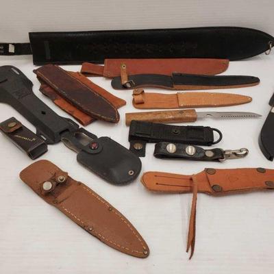 840: Leather Knife Holsters
Includes Leatherman, A. G. Russell Springdale Ark and Sun Fish. Measures approx from 4