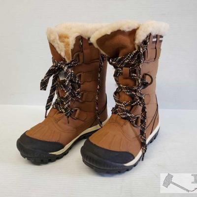 9027: 	
8 Pairs of BearPaw Winter Boots
Sizes vary from 3-10. Seven pairs slip on boots with Faux Fur lining. One pair snow type boots w/...