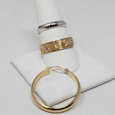 1075:Two 14k Gold Bands and Hoop Earring, 6.7g
Ring are size 8 and 11.5, combines weight is approx 6.7g