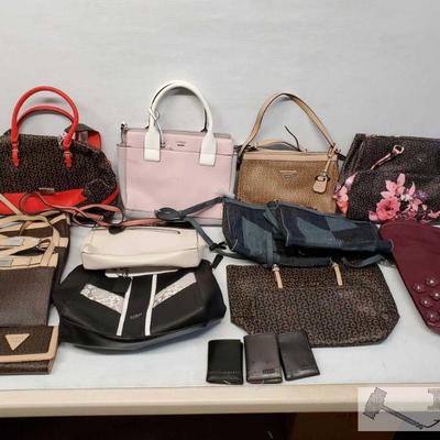 9032: 	
13 Guess Purses and 4 Guess Wallets
Unathenticated 13 Guess Purses in various designs and sizes and 1 womens Guess wallet and 3...