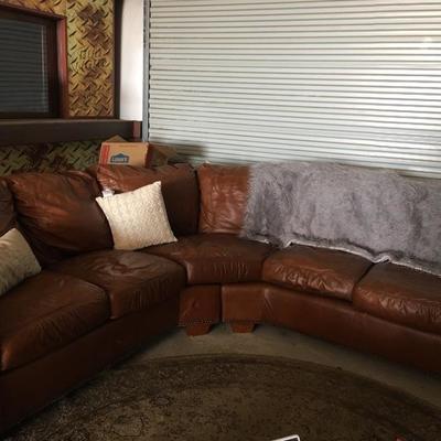Very nice leather sectional couch. 