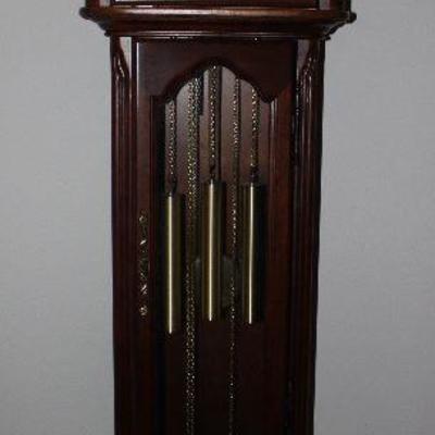 Howard Miller triple chime: Westminster, St. Michaelâ€™s and Whittington, Traditional Grandfather Clock with Moon Dial.  (79â€H x 12â€D...