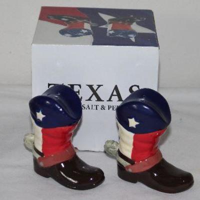 A portion of a Salt and Pepper Shaker Collection: House Built Upon a Rock, Texas Boots in Original Box  and a Vintage Dalmatian Dog with...