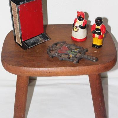 Small Wood Stool Displaying Vintage Black & Red Tin Match Safe, Wilton Cast Iron Pennsylvania Dutch Trivet and Black Americana Salt...