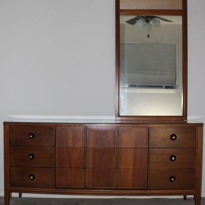 Mid-century walnut finish 9 Drawer Dresser with protective glass top (65â€W x 18â€D  30.5â€H) and Mirror w/ aluminum weave Embossed...